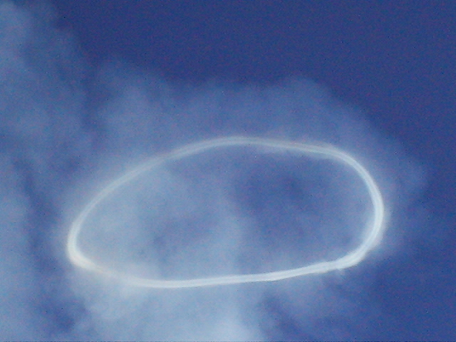 Ring of smoke above the summit craters