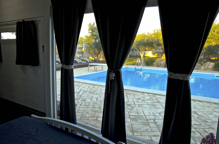The windows facing the pool