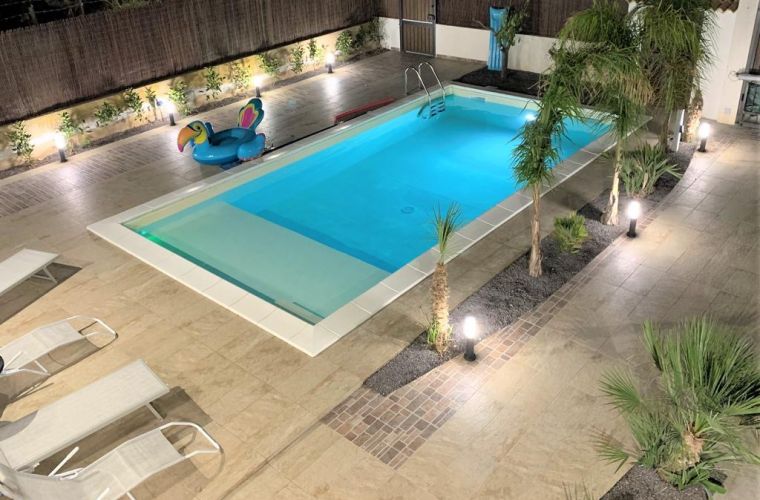 The swimming pool has a shallow water patio where the little ones can safely swim