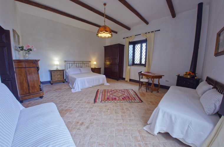 The master bedroom is very spacious, there is also a single bed in addition to the double