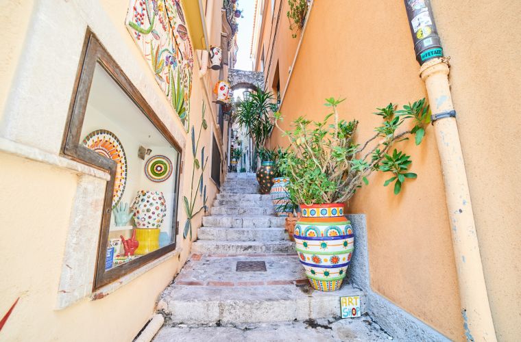 The colorful and typical street of Taormina