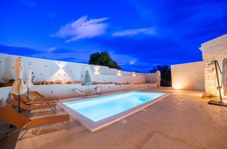 The exterior shows a spacious pool area, another bath with shower, the BBQ area, and many lovely corners with lounges, divans and with the amazing panorama of the Mediterranean sea