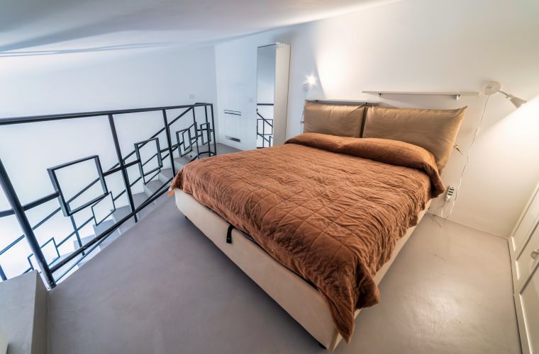 Another double bedroom with lounge and bed in the loft