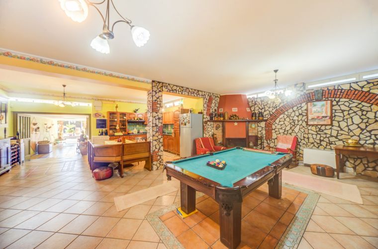 Pool table and stone wall