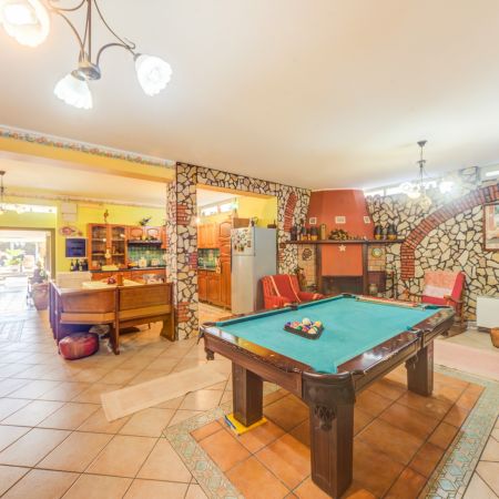 Pool table and stone wall
