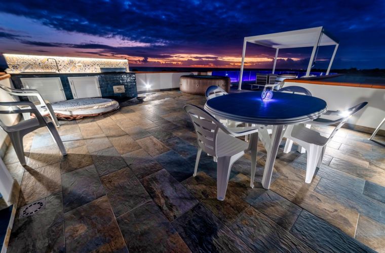 Barbecue, jacuzzi, lounge, seascape at evening