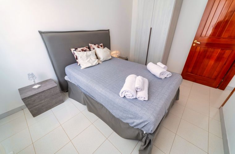 The air conditioning is provided all around the house (bedrooms and living-kitchen area).