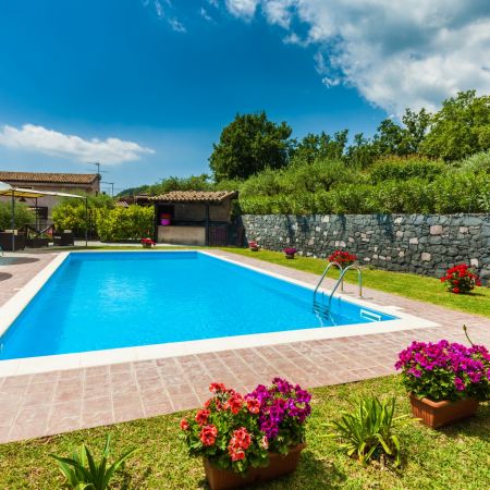 The villa is immersed in a lush park