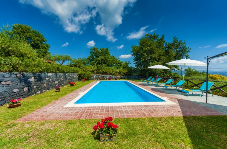 The pool is inside a green area