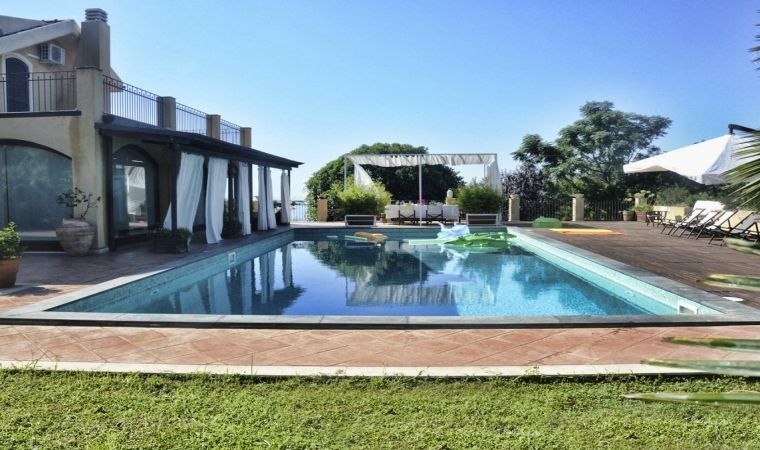 This gorgeous villa extends on 3000 sqm park