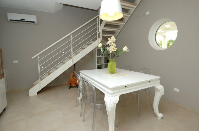 The first floor is reached by a staircase that leads to the sleeping area consisting of three bedrooms, two double bedrooms and one single bedroom.