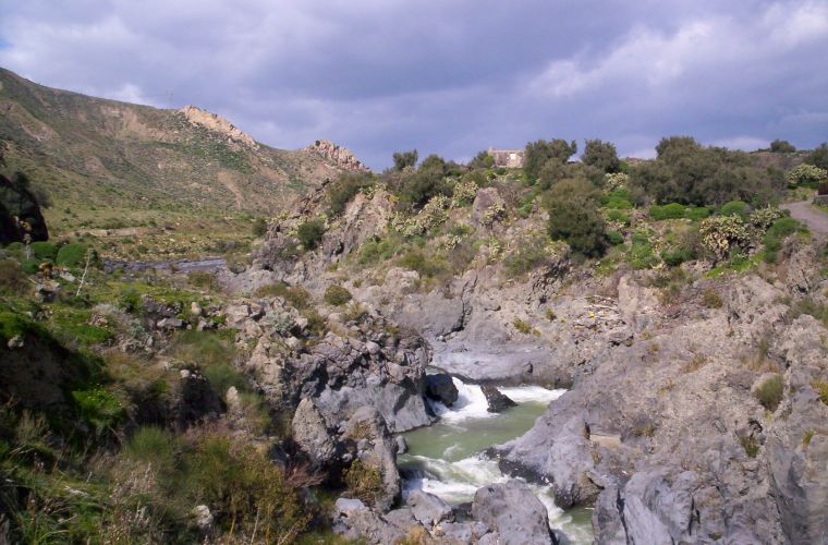The Simeto river flows below the Saraceni bridge