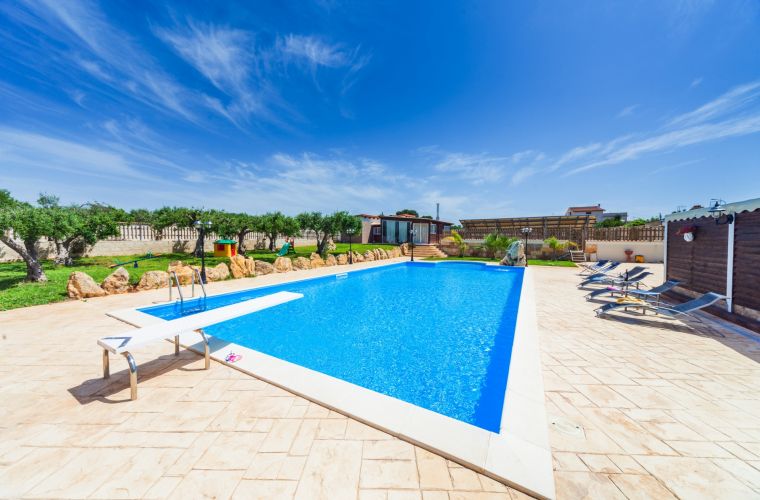 Sicilian blue sky and pool